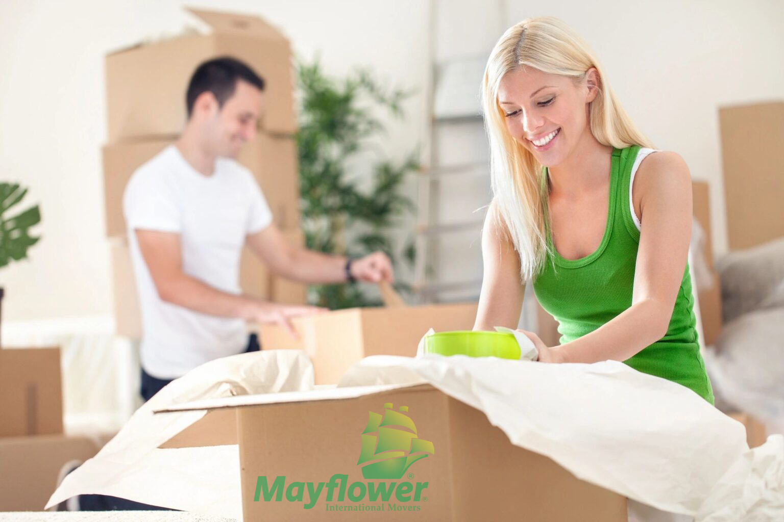 Woman in Green Packing